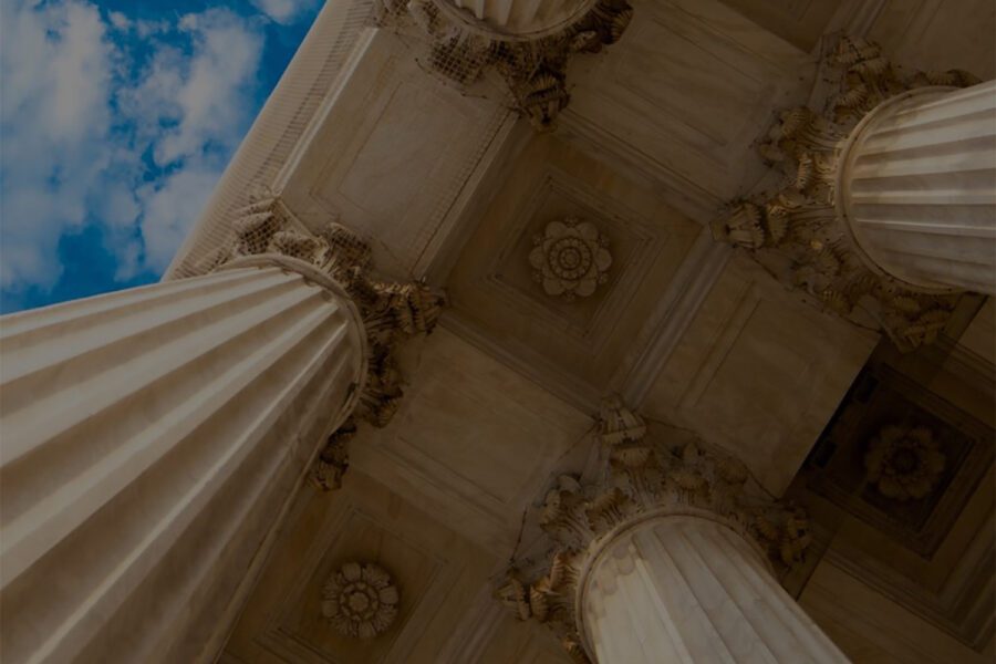 Looking up the columns at the Supreme Court building