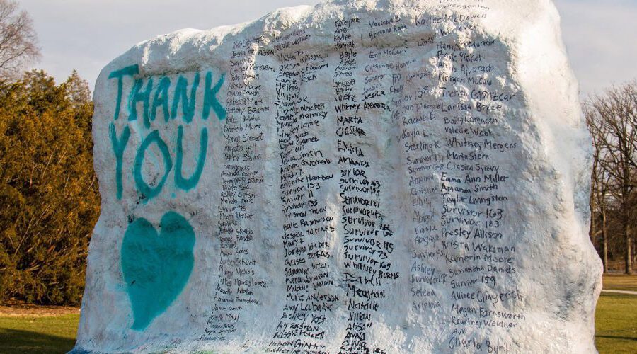 Survivors names painted on the MSU Rock