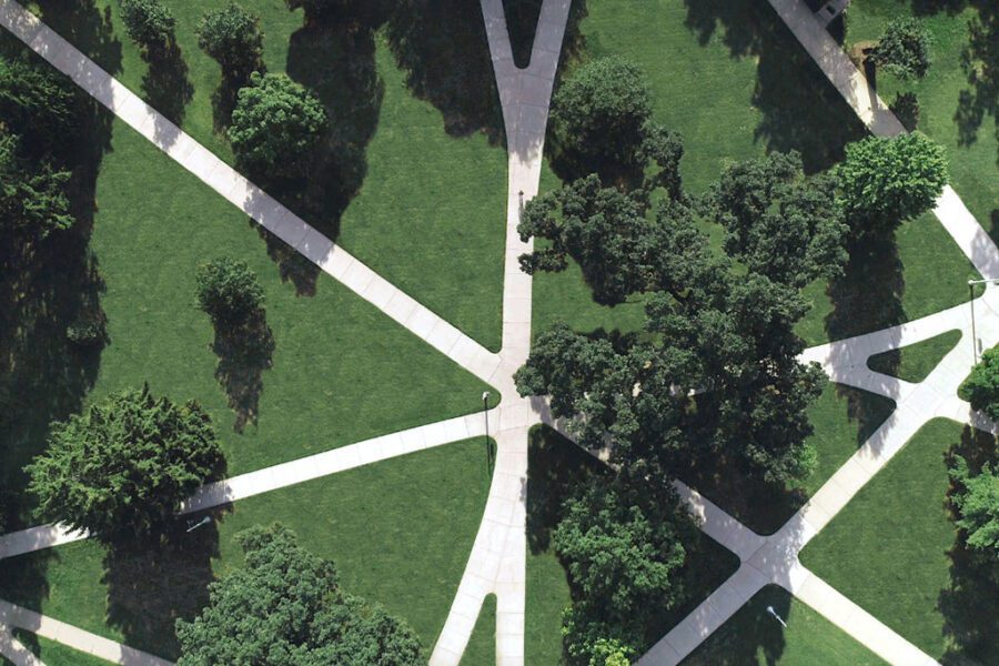 Aerial view of the center of MSU campus with intersecting pathways and trees.